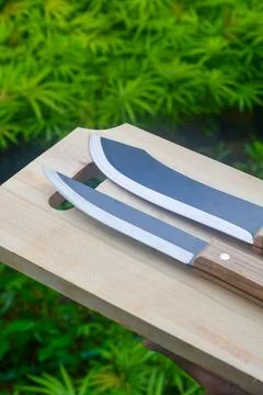 Sharp...do not touch! Chef's kitchen knife isolated on white background Stock Photos