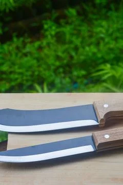 Sharp...do not touch! Chef's kitchen knife isolated on white background Stock Photos