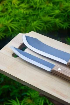 Sharp...do not touch! Chef's kitchen knife isolated on white background Stock Photos