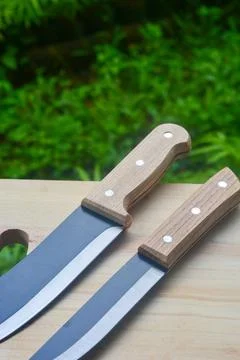 Sharp...do not touch! Chef's kitchen knife isolated on white background Stock Photos