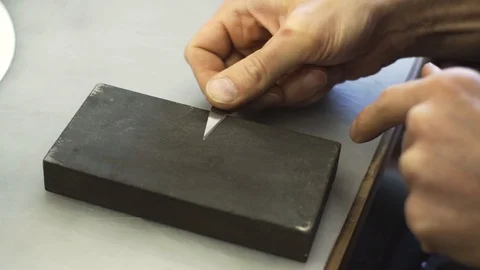 Sharpen the blade Stock Footage 106420713