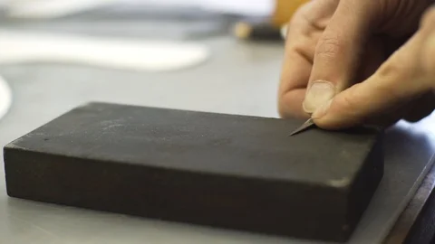 Sharpen the blade Stock Footage 106420740