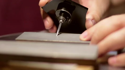 Sharpen dremel engraving Stock Footage 65740908
