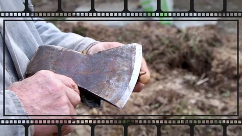 Sharpen a pencil with an ax Stock Footage 109048140