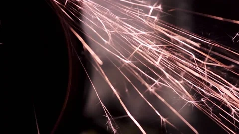Sharpened close-up in the dark with bright sparks 動画素材 135515757