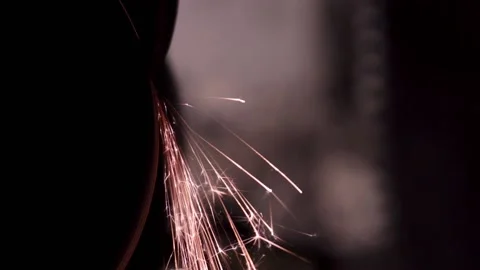 Sharpened close-up in the dark with bright sparks. copy space Stock-Footage 137970755