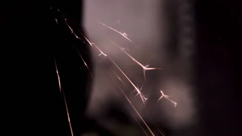 Sharpened close-up in the dark with bright sparks. copy space Stock Footage 140108600