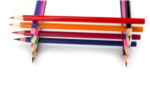 Sharpened colored pencils on the white background Stock Photos