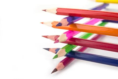 Sharpened colored pencils on the white background Stock Photos