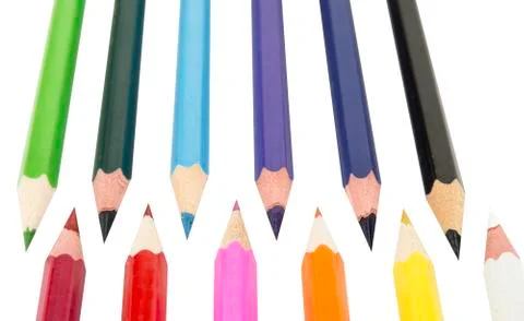 Sharpened colored pencils on the white background Stock Photos