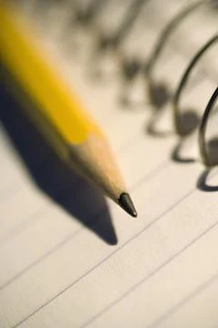 Sharpened Pencil On Coil Notebook Stock Photos