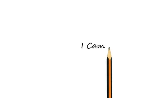 Sharpened pencil writing 'I Can' on a white background Stock Photos