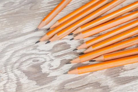 Sharpened Yellow Striped Pencils on White Wooden Table. Office, and Back to.. Stock-Fotos