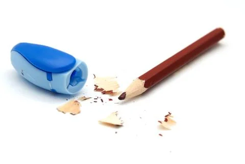 Sharpener with pencil on white background Stock Photos