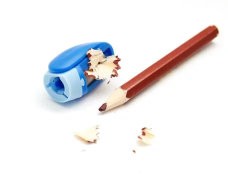 Sharpener with pencil on white background Stock Photos