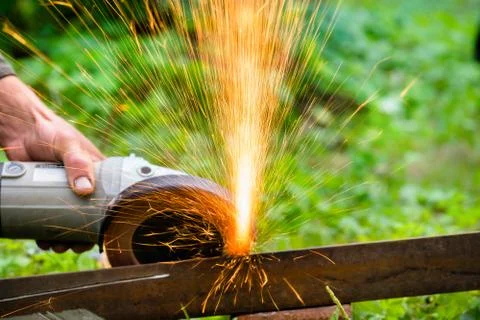 Sharpening and cutting of iron abrasive disk machine Stock Photos