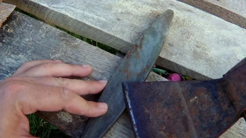 Sharpening the ax Stock Footage 78047107