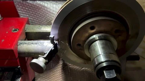 Sharpening brake discs. Selective focus. Stock Photos