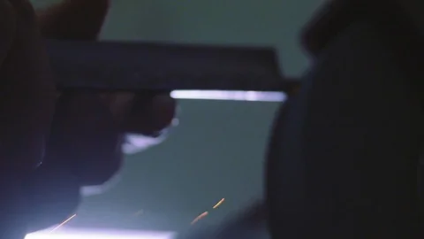 Sharpening a chisel Stock Footage 83496317