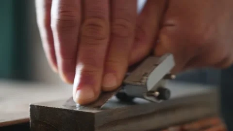 Sharpening a chisel on a grinder. professional tool sharpening Stock Footage 154253352