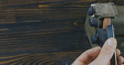 Sharpening A Chisel On Grinding Machine. Male Hands, Sharpening A Chisel Stock Footage 121975775