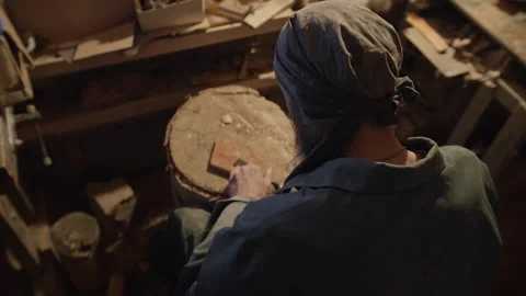 Sharpening a chisel with a whetstone Video stock 169156118