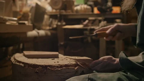 Sharpening a chisel with a whetstone Stock Footage 169156226