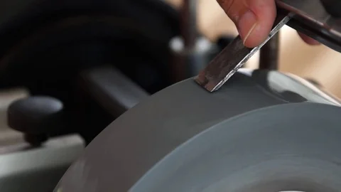 Sharpening a HSS chisel Stock Footage 75955539