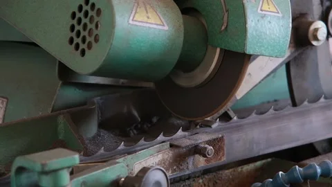 Sharpening an industrial saw on a machine Stock Footage 165451016