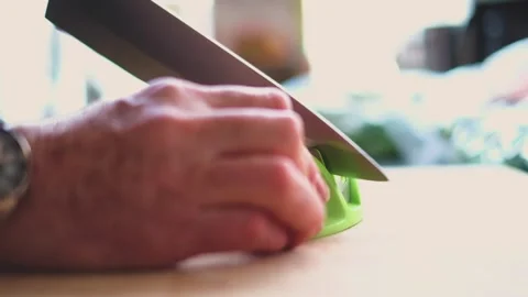 Sharpening a Kitchen Knife Stock Footage 301649031