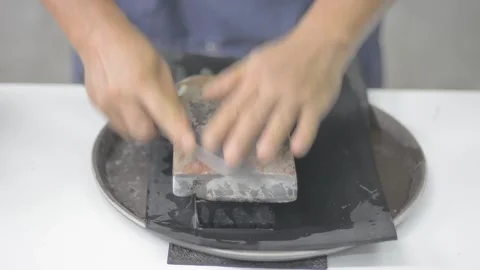 Sharpening  a knife Stock Footage 159339954