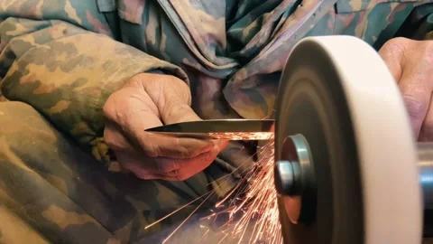 Sharpening a knife. Video stock 235621094