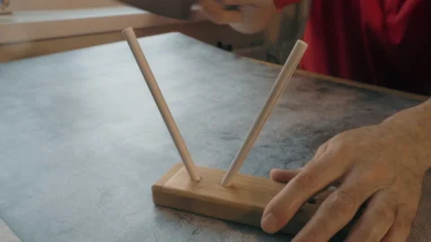 Sharpening a knife in the kitchen. Stock Footage 146015874