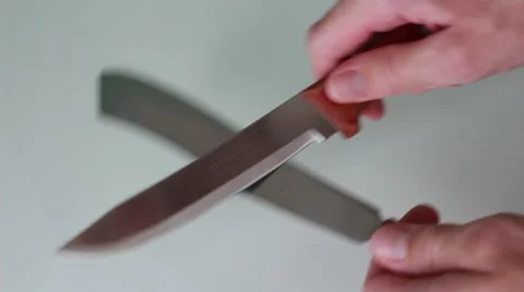 Sharpening knife with knife Stock Footage 65371981