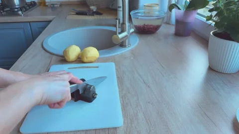 Sharpening Knife With Sharpener Preparing Tool For Cooking Kitchen Stock-Footage 336458089