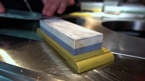 Sharpening A Knife With A Stone Stock Footage 159508652