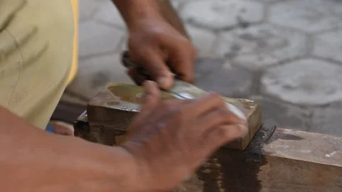 Sharpening the knife with whetstone Stock Footage 141831313