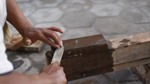 Sharpening the knife with whetstone Stock Footage 141831340
