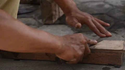 Sharpening the knife with whetstone Stock Footage 141831544