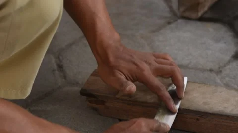 Sharpening the knife with whetstone Stock Footage 141831707