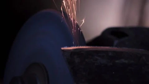 Sharpening an old grain ax close-up with bright sparks Stock Footage 137133868