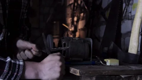 Sharpening old scissors close-up with bright sparks Video stock 137133887