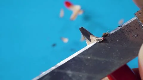 Sharpening a pencil with a knife Stock-Fotos