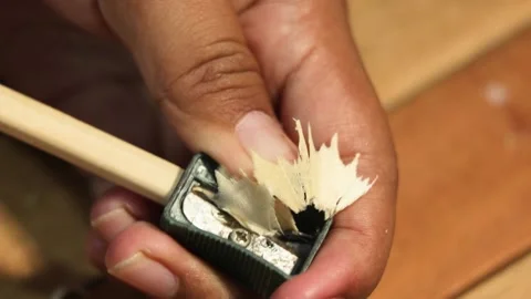 Sharpening Pencil Using Pencil Sharpener Close Up Stock Footage 329478399
