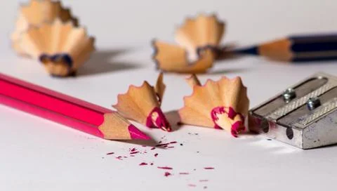 Sharpening a red pencil Stock Photos