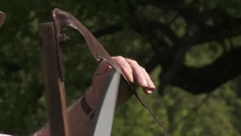 Sharpening the scythe Stock Footage 303964584
