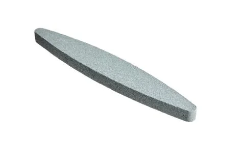 Sharpening stone. Grindstone or whetstone sharpener Stock Photos