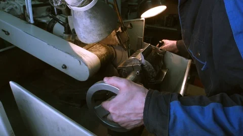 Sharpening of the tool behind the factory Stock Footage 95772958