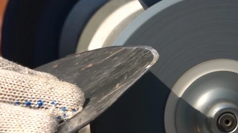 Sharpening of tool with unbalanced grinding machine in slow motion close up. Stock Footage 98676394