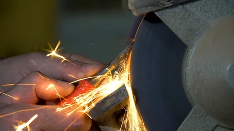 Sharpening tool before working on a tool Stock Footage 107841245